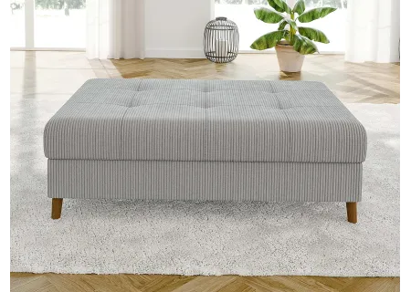 Maya - Ecksofa mit Schlaffunktion und Hocker mit Braun Holzfüßen im skandinavischen Stil aus Cord-Stoff