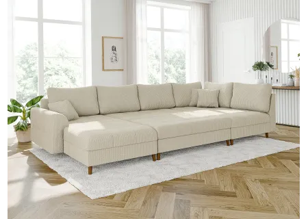 Maya - Wohnlandschaft mit Schlaffunktion und Hocker mit Braun Holzfüßen im skandinavischen Stil aus Cord-Stoff