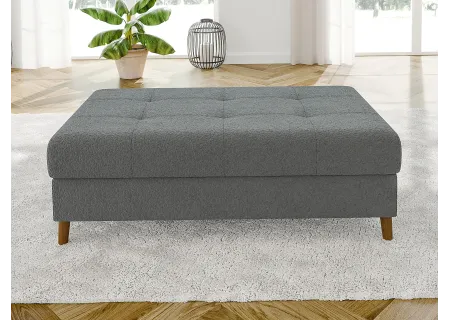 Lars - Ecksofa mit Schlaffunktion und Hocker mit Braun Holzfüßen im skandinavischen Stil aus Boucle-Stoff