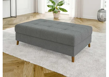 Lars - Ecksofa mit Schlaffunktion und Hocker mit Braun Holzfüßen im skandinavischen Stil aus Boucle-Stoff