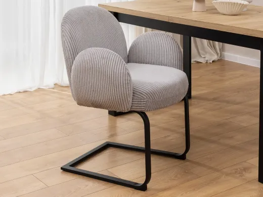 Vela - Polsterstuhl im Japandi Stil und im runden Design aus grauem Cord mit schwarzem Metallgestell