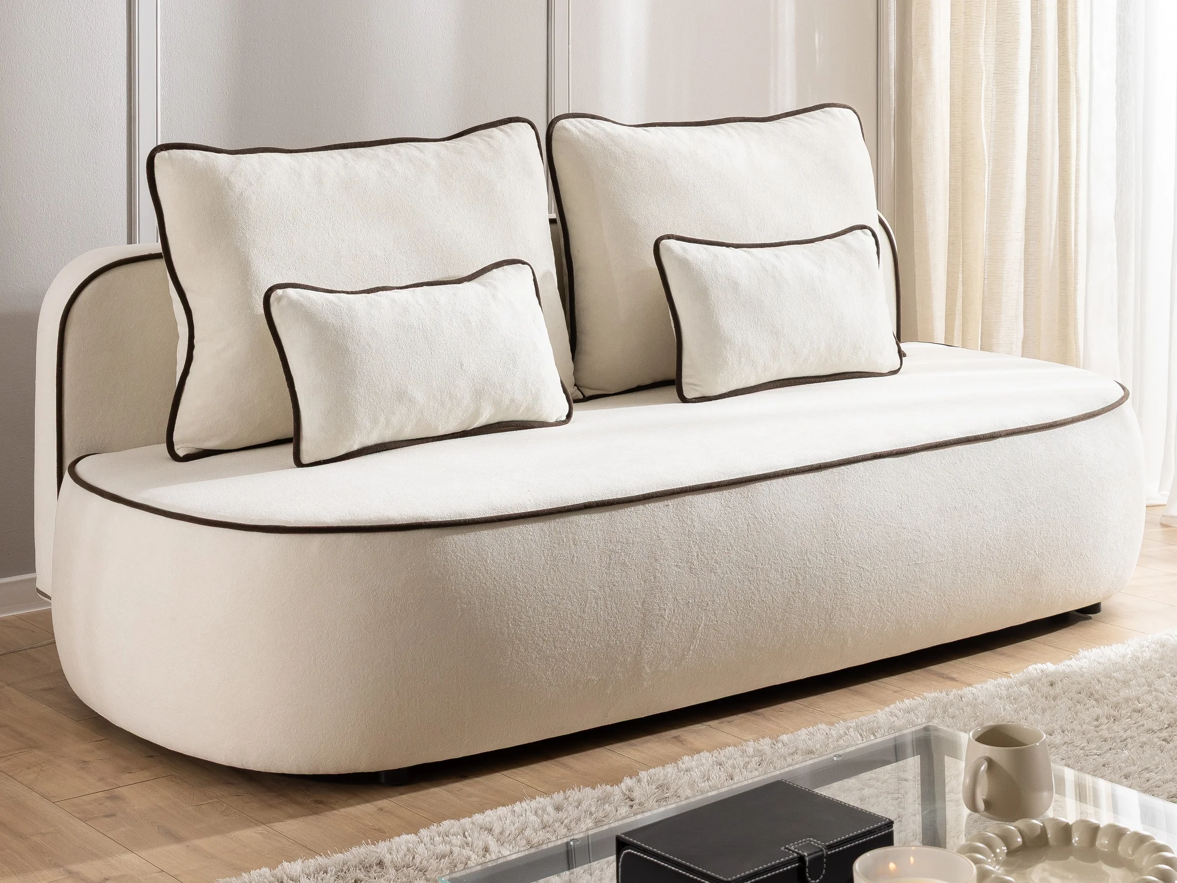 Vero – Modernes und abgerundetes 3-Sitzer-Schlafsofa mit Bettkasten und Kontrastpaspel aus Plüschstoff